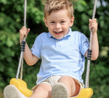 Kind Schommel Kaps 02