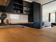 Groepsaccommodatie Kapshoeve interieur keuken zithoek.JPG